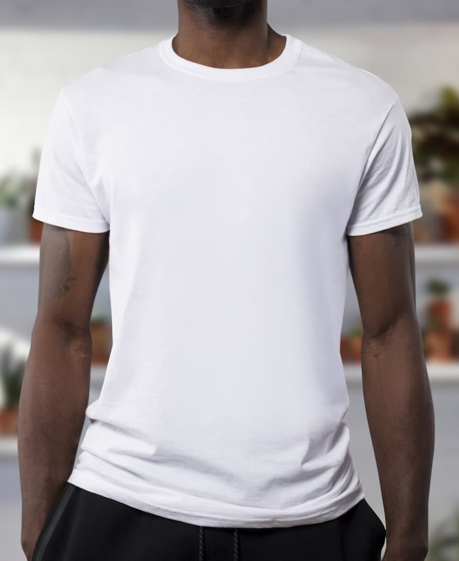 A plain white crew neck T-shirt being photographed